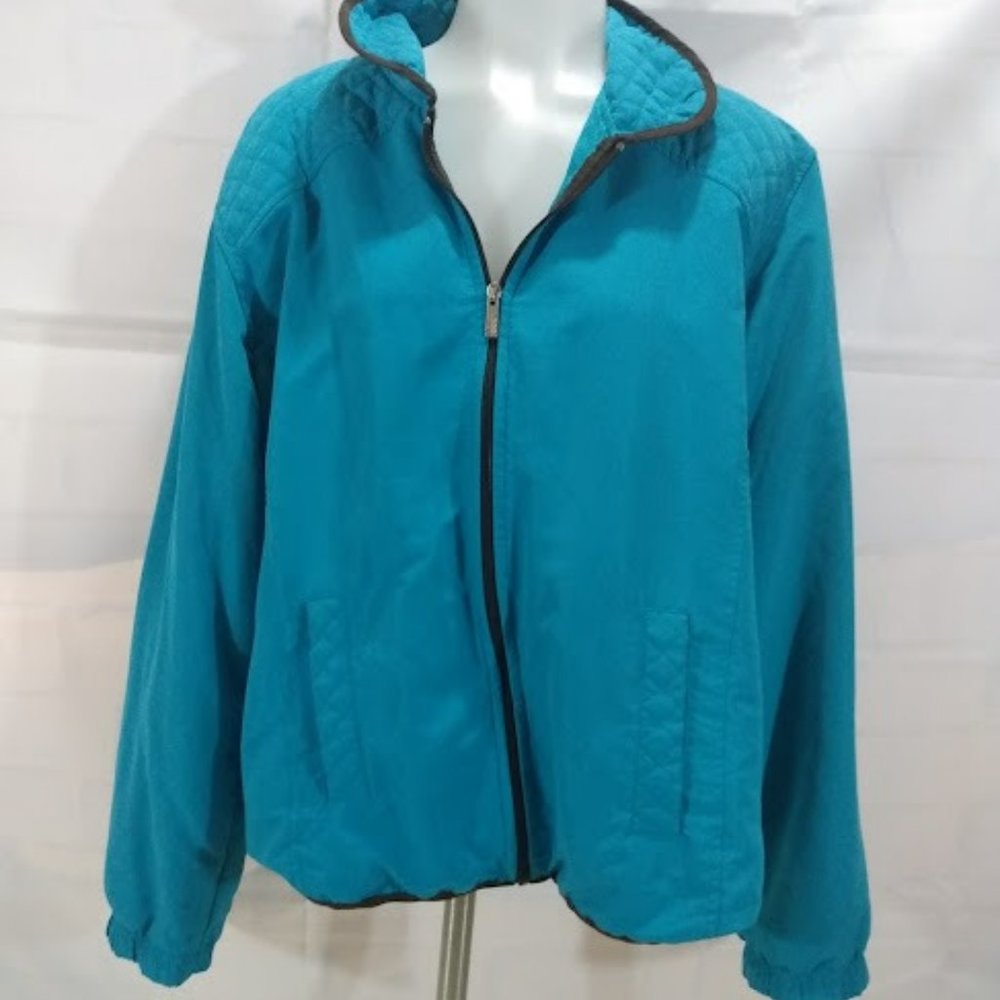 Three Hearts: Teal jacket with zip closure.